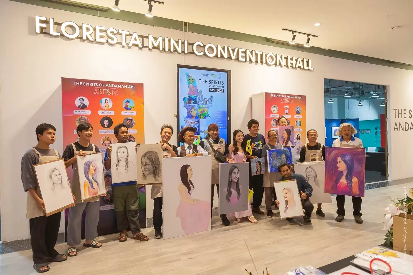 Members of the Phuket Art Association with their work